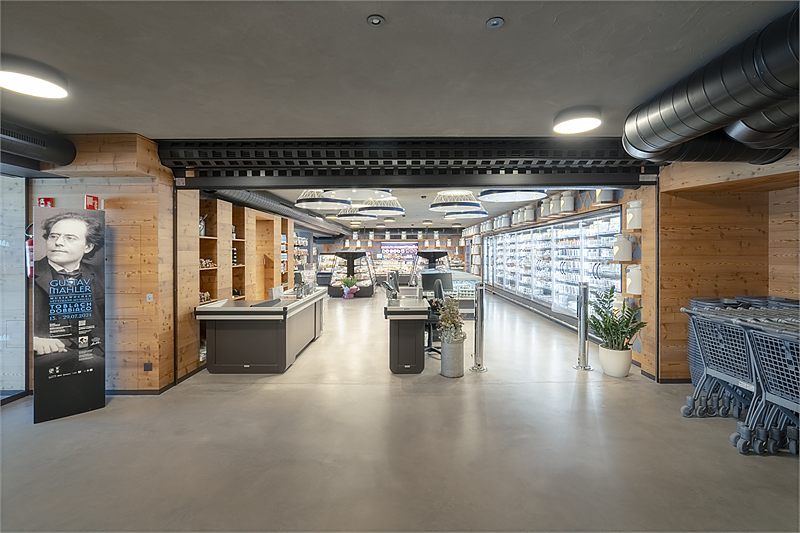 View into the shop with cheese counter and shelves